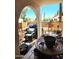 Cozy patio area with seating, a grill, and privacy fencing at 5136 E Evergreen St # 1053, Mesa, AZ 85205