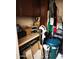 View of the home's storage area featuring shelves, cleaning supplies and organization solutions at 5136 E Evergreen St # 1053, Mesa, AZ 85205