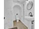 Modern bathroom featuring marble tiling, vanity, and contemporary fixtures at 538 S Macdonald --, Mesa, AZ 85210
