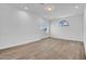 Bright bedroom featuring laminate flooring and a window for ample natural light at 538 S Macdonald --, Mesa, AZ 85210