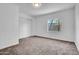Bright bedroom featuring natural light, neutral colors, and closet doors at 538 S Macdonald --, Mesa, AZ 85210