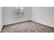 Bedroom featuring natural light, neutral carpet, and an abundance of space at 538 S Macdonald --, Mesa, AZ 85210