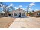 Charming single-story home with a spacious driveway and welcoming front entrance at 538 S Macdonald --, Mesa, AZ 85210