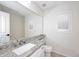 Bright bathroom features granite countertops, a white vanity, and a large mirror at 705 W Country Estates Ave, Gilbert, AZ 85233