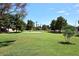 Lush green community park with ample space for recreation and relaxation at 705 W Country Estates Ave, Gilbert, AZ 85233