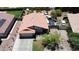 Beautiful home with tile roof, two-car garage, and landscaped front yard in a suburban setting at 7403 W Montebello Ave, Glendale, AZ 85303