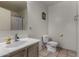 Bathroom with vanity, toilet, and a framed mirror at 7403 W Montebello Ave, Glendale, AZ 85303
