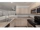 The kitchen has stainless steel appliances and ample counter space at 7403 W Montebello Ave, Glendale, AZ 85303