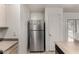 Clean kitchen with stainless steel refrigerator and lots of counter space at 7403 W Montebello Ave, Glendale, AZ 85303
