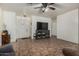 Open-concept living room featuring tile flooring, and a front door at 7403 W Montebello Ave, Glendale, AZ 85303