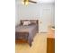 Cozy bedroom with hardwood floors, a comfortable bed, and simple decor creating a relaxing space at 846 E Ocotillo Rd, Phoenix, AZ 85014
