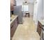 Modern kitchen with stainless steel appliances, granite countertops, and sleek wood cabinetry at 846 E Ocotillo Rd, Phoenix, AZ 85014