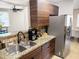 Beautiful kitchen featuring granite countertops, stainless appliances, and wooden cabinetry at 846 E Ocotillo Rd, Phoenix, AZ 85014