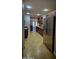 Modern kitchen features sleek wood cabinetry, stainless steel appliances, recessed lighting, and tile flooring at 846 E Ocotillo Rd, Phoenix, AZ 85014