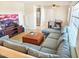 Spacious living room featuring modern furnishings, tile flooring, and ample natural light at 846 E Ocotillo Rd, Phoenix, AZ 85014