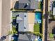 Stunning aerial view of the property showcasing the backyard pool, patio, and well-manicured landscaping at 8708 E Rancho Vista Dr, Scottsdale, AZ 85251