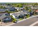 Stunning aerial view of a single-Gathering home showcasing its landscaped yard, charming patio, and neighborhood setting at 8708 E Rancho Vista Dr, Scottsdale, AZ 85251