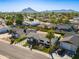 High-angle shot of a residential property highlighting its well-manicured yard, inviting outdoor spaces, and community ambiance at 8708 E Rancho Vista Dr, Scottsdale, AZ 85251