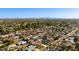 Expansive aerial view of the neighborhood showcasing the lush greenery and a beautiful mountain backdrop at 8708 E Rancho Vista Dr, Scottsdale, AZ 85251