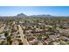 Breathtaking aerial view of a residential area, highlighting the picturesque mountain scenery and community layout at 8708 E Rancho Vista Dr, Scottsdale, AZ 85251