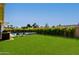 Expansive backyard with a pool, spa, outdoor kitchen, and ample space for recreation and relaxation at 8708 E Rancho Vista Dr, Scottsdale, AZ 85251