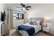 Charming bedroom with tufted headboard, neutral color palette, and plenty of natural light at 8708 E Rancho Vista Dr, Scottsdale, AZ 85251