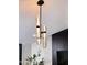 Modern chandelier highlighting stylish design elements at 8708 E Rancho Vista Dr, Scottsdale, AZ 85251