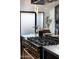 Close-up of a luxury kitchen with a gas range and upscale cabinetry, blending style with functionality at 8708 E Rancho Vista Dr, Scottsdale, AZ 85251