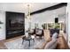 Open-concept living room boasts modern fireplace and stylish decor at 8708 E Rancho Vista Dr, Scottsdale, AZ 85251