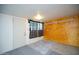 Basement with unfinished walls and carpet, with an adjacent closet at 10018 N 97Th Dr # A, Peoria, AZ 85345