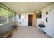 Covered patio with a table, barbeque, and decorations at 10018 N 97Th Dr # A, Peoria, AZ 85345