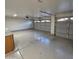 Spacious three car garage offering ample parking and storage space at 1032 E Sheffield Ave, Chandler, AZ 85225