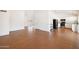 Bright living space featuring an open floor plan, tiled floors, and a seamless transition to the kitchen at 1044 N Abner --, Mesa, AZ 85205