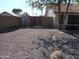 Gated side yard with stone landscaping and access to the main house at 1044 N Abner --, Mesa, AZ 85205