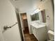 Bathroom featuring a white vanity, medicine cabinet, and updated fixtures at 10828 N Biltmore Dr # 133, Phoenix, AZ 85029