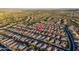 Scenic aerial view of a Primary planned community with beautiful homes and desert landscape at 13330 W Milton Dr, Peoria, AZ 85383