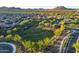 Beautiful aerial view of the community dog park with lush greenery at 13330 W Milton Dr, Peoria, AZ 85383