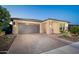 Charming one-story home featuring a brick driveway and desert landscaping at 13330 W Milton Dr, Peoria, AZ 85383