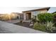 Charming one-story home featuring desert landscaping and a brick driveway at 13330 W Milton Dr, Peoria, AZ 85383