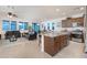 Open concept kitchen with granite countertops and a combined living area at 13330 W Milton Dr, Peoria, AZ 85383