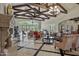 Spacious clubhouse lounge area with comfortable seating, fireplace and views to the outdoor pool area at 1367 S Country Club Dr # 1221, Mesa, AZ 85210