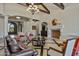 Elegant clubhouse great room features a stately fireplace, exposed beams, and ample seating at 1367 S Country Club Dr # 1221, Mesa, AZ 85210