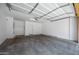 Spacious two-car garage featuring high ceilings, ample space, and a clean, well-lit interior at 1367 S Country Club Dr # 1221, Mesa, AZ 85210