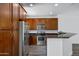Modern kitchen with stainless appliances, granite counters, and ample cabinet space at 1367 S Country Club Dr # 1221, Mesa, AZ 85210