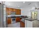 Well-lit kitchen featuring stainless steel appliances and sleek countertops at 1367 S Country Club Dr # 1221, Mesa, AZ 85210