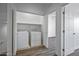 Laundry room with a side-by-side washer and dryer and wood-look floors at 1367 S Country Club Dr # 1221, Mesa, AZ 85210