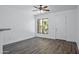 Open living space featuring wood-look floors, white walls, and lots of natural light at 1367 S Country Club Dr # 1221, Mesa, AZ 85210