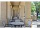 Cozy outdoor seating area with comfortable chairs and tables, complemented by an outdoor grill for convenient entertaining at 1367 S Country Club Dr # 1221, Mesa, AZ 85210