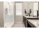 Elegant bathroom with tiled shower, granite counters, and dual vanity sinks at 14481 W Via Del Oro --, Surprise, AZ 85379