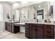Bathroom features dual vanities, granite countertops, and a bright, tiled shower at 14481 W Via Del Oro --, Surprise, AZ 85379
